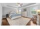 This is the main bedroom showing a large bed, neutral walls, and natural light at 633 Copper Beech Ln, Wake Forest, NC 27587