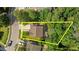 An aerial view highlighting the property's perimeter and surrounding landscape at 648 Long Melford Dr, Rolesville, NC 27571