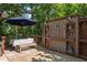 Charming outdoor deck with a dining area and decorative wall features, perfect for relaxing and entertaining guests at 648 Long Melford Dr, Rolesville, NC 27571
