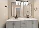 Bathroom with double sinks, modern fixtures, and updated hardware at 71 E Boxley Dr, Wendell, NC 27591