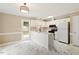Modern kitchen with white cabinets, stylish countertops, and stainless steel appliances at 71 E Boxley Dr, Wendell, NC 27591