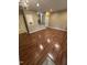 Spacious, open-concept living room with hardwood floors, neutral paint, and access to the kitchen at 710 N Person St # 103, Raleigh, NC 27604