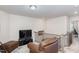 Comfortable loft with a large screen television and leather seating at 728 Silo Park Dr, Wake Forest, NC 27587