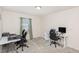 Bright home office space with two desks and neutral carpeting at 728 Silo Park Dr, Wake Forest, NC 27587