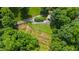 Expansive aerial view of wooded property with private driveway at 812 Kenmore Rd, Chapel Hill, NC 27514