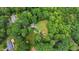 Overhead shot of wooded neighborhood with lush greenery and paved streets at 812 Kenmore Rd, Chapel Hill, NC 27514