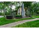 Quaint guest house surrounded by lush greenery and a well-manicured lawn at 812 Kenmore Rd, Chapel Hill, NC 27514