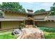 An inviting stone path leading to a grand residence with stone and wood exterior at 812 Kenmore Rd, Chapel Hill, NC 27514
