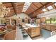 Spacious kitchen with skylights, center island with seating, wooden cabinets, and an open layout at 812 Kenmore Rd, Chapel Hill, NC 27514
