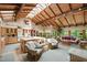 Bright kitchen features skylights, a center island, wooden cabinetry, and seating areas at 812 Kenmore Rd, Chapel Hill, NC 27514