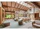 Bright kitchen with wood cabinets, skylights, an island, and casual seating in an airy open layout at 812 Kenmore Rd, Chapel Hill, NC 27514