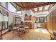 Charming eat-in kitchen features skylights, warm wood tones, and stainless-steel appliances at 812 Kenmore Rd, Chapel Hill, NC 27514