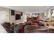 Basement living room with comfortable seating, built-in entertainment unit, and open layout at 812 Kenmore Rd, Chapel Hill, NC 27514