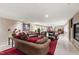 Basement living room with comfortable seating, recessed lighting, and open layout to the game room at 812 Kenmore Rd, Chapel Hill, NC 27514