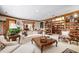 Comfortable living room features neutral palette, beautiful light, and open space for entertaining at 812 Kenmore Rd, Chapel Hill, NC 27514