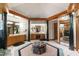 Large main bathroom with custom cabinetry, mirrors, marble pillars, and spacious vanity areas at 812 Kenmore Rd, Chapel Hill, NC 27514