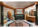 Large main bathroom features large soaking tub, custom cabinetry, and natural light at 812 Kenmore Rd, Chapel Hill, NC 27514