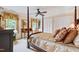 Cozy bedroom with a four-poster bed, charming window nook, and natural light creates a serene retreat at 820 Kenmore Rd, Chapel Hill, NC 27514