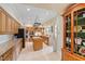 Traditional style kitchen featuring wood cabinets, an island with a sink, and modern stainless steel appliances at 820 Kenmore Rd, Chapel Hill, NC 27514