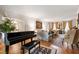 Elegant living room featuring a grand piano and stylish furnishings at 820 Kenmore Rd, Chapel Hill, NC 27514