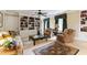 Inviting living room features custom built-ins, a ceiling fan, and sophisticated decor for a comfortable space at 820 Kenmore Rd, Chapel Hill, NC 27514