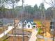 New construction home showcasing the exterior, landscaping and spacious lot in a wooded setting at 913 Harrison Ridge Rd, Wake Forest, NC 27587