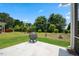 Backyard features an outdoor fire pit and green space at 10 Forest Brook Way, Clayton, NC 27520