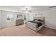 Well-lit bedroom features neutral decor, modern furniture, and natural light at 10 Forest Brook Way, Clayton, NC 27520