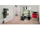 Bright home gym with exercise equipment, natural light, and french doors at 10 Forest Brook Way, Clayton, NC 27520