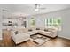 Living room featuring an open-concept floor plan with views into the kitchen at 10 Forest Brook Way, Clayton, NC 27520