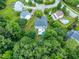 Expansive property featuring a swimming pool and mature trees surrounding the home at 1003 Burnt Hickory Ct, Apex, NC 27502