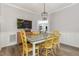 Light-filled dining room features a decorative chalkboard at 1003 Burnt Hickory Ct, Apex, NC 27502