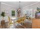 Bright dining room featuring stylish lighting and decor at 1003 Burnt Hickory Ct, Apex, NC 27502