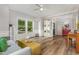 Spacious living area with hardwood floors, modern furnishings, and bright, airy ambiance at 1003 Burnt Hickory Ct, Apex, NC 27502
