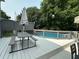 Back deck features pool and picnic table, perfect for outdoor summer fun with Gathering and friends at 1003 Burnt Hickory Ct, Apex, NC 27502