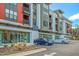 Upscale apartments featuring ground level retail shopping and second story balconies for residents to enjoy at 10603 Friendly Neighbor Ln, Raleigh, NC 27614