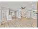 Open-concept layout showcasing a spacious living area with stairs, and natural light at 10603 Friendly Neighbor Ln, Raleigh, NC 27614