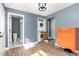 Well-organized laundry room featuring a stackable washer and dryer with access to a toilet room at 109 St Marys St, Garner, NC 27529