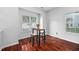 Cozy dining area bathed in natural light from the large window at 10941 Pendragon Pl, Raleigh, NC 27614