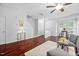 Open-concept living area boasting hardwood floors, neutral walls, and a cozy atmosphere at 10941 Pendragon Pl, Raleigh, NC 27614