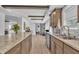 Kitchen featuring an island, stainless steel appliances, and tile backsplash at 1118 Oakridge Duncan Rd, Fuquay Varina, NC 27526
