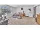 Relaxing main bedroom featuring a comfortable bed, sliding barn door, and neutral decor at 1118 Oakridge Duncan Rd, Fuquay Varina, NC 27526