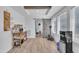 Bright room with two windows, laminate floors, ceiling beams and modern appliances and decor at 1118 Oakridge Duncan Rd, Fuquay Varina, NC 27526