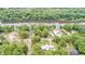 A captivating aerial view displays the property's proximity to the river and mature trees at 1164 Keith Hills Rd, Lillington, NC 27546