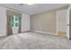 Bedroom featuring patterned wallpaper, plush carpeting, and bright natural light at 1164 Keith Hills Rd, Lillington, NC 27546