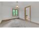 Bright bedroom with natural light, carpet, and chandelier at 1164 Keith Hills Rd, Lillington, NC 27546