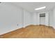 Bright bedroom with white walls, light-colored floor, and a closet, perfect for storage at 1164 Keith Hills Rd, Lillington, NC 27546