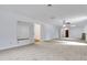 Spacious bonus room featuring neutral carpet and ample lighting at 1164 Keith Hills Rd, Lillington, NC 27546