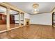 A spacious living room featuring hardwood floors, decorative columns and fireplace at 1164 Keith Hills Rd, Lillington, NC 27546
