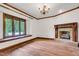 Elegant living room with hardwood floors and a decorative fireplace at 1164 Keith Hills Rd, Lillington, NC 27546